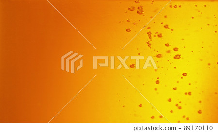 Macro photo of bubbling beer, closeup. 89170110