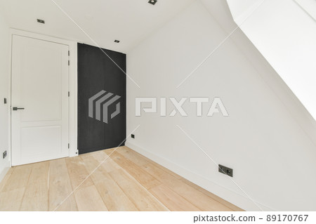 Interior of a spacious room without furniture Interior of a spacious room without furniture 89170767