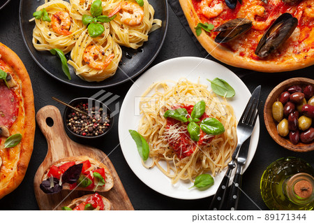 Italian cuisine. Pizza, pasta and toasts Italian cuisine. Pizza, pasta and toasts 89171344