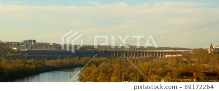 Flying over the hydroelectric power station on the Dnieper River 89172264