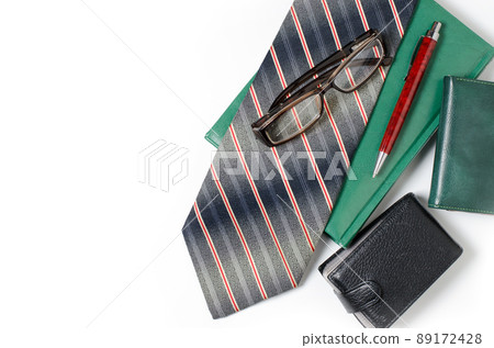Men's accessories. Tie, green notebook, glasses, purse, business Men's accessories. Tie, green notebook, glasses, purse, business 89172428
