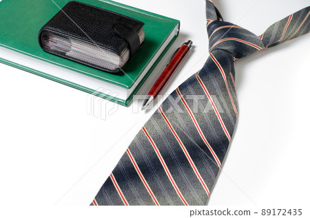 Men's accessories. Tie, green notebook, glasses, purse, business Men's accessories. Tie, green notebook, glasses, purse, business 89172435