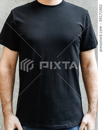 A man in a black T-shirt 89172802