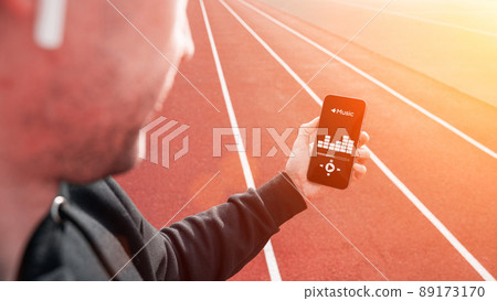 Sport music. Lifestyle workout exercise man training. Male with headphones. Sport music and healthy lifestyle. 89173170