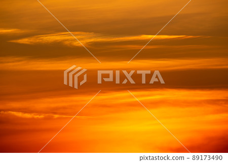 Beautiful golden sunset sky with clouds 89173490