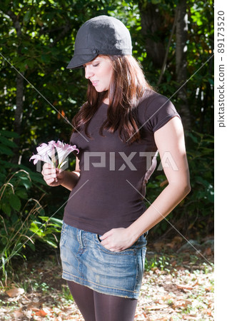 beautiful woman in the forest 89173520