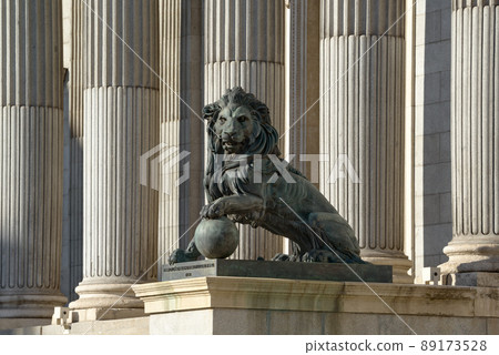 Lion sculpture in the Congress of Deputies (Congreso de Los Diputados), Spanish Parliament, Palacio de las Cortes, Madrid. Translation: Cast of cannons taken to the enemy in the War of Africa in 1860 89173528