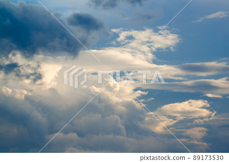 Beautiful Clouds Illuminated by the Sun in the Sky Background 89173530