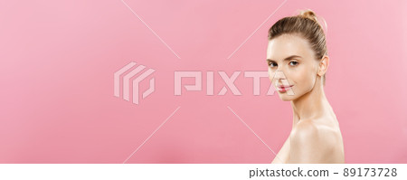 Skin Care Concept - Charming young caucasian woman with perfect makeup photo composition of brunette girl. Isolated on pink background with Copy Space. Skin Care Concept - Charming young caucasian woman with perfect makeup photo composition of brunette girl. Isolated on pink background with Copy Space. 89173728