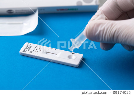 Corona virus antigen fast test. Lab card kit test for COVID-19. Corona virus antigen fast test. Lab card kit test for COVID-19. 89174035