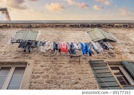 Colorful street in Old town of Kotor on a sunny day, Montenegro 89177161