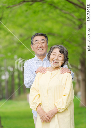 Senior couple portrait outdoors 89178088