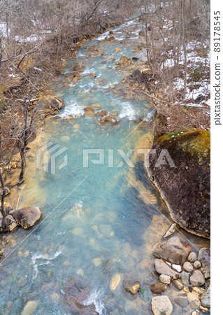 Muddy river in winter (Zao Town, Miyagi Prefecture) 89178545