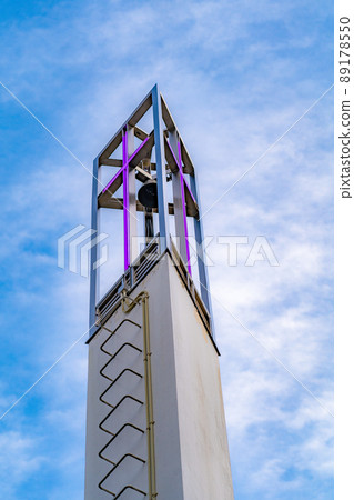 Blue sky and the cross of the church Blue sky and the cross of the church 89178550