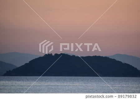 Island floating in the sunrise 89179832