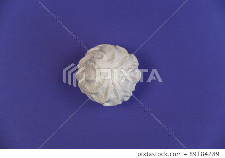 Zephyr. A sweet treat against a blue background Zephyr. A sweet treat against a blue background 89184289