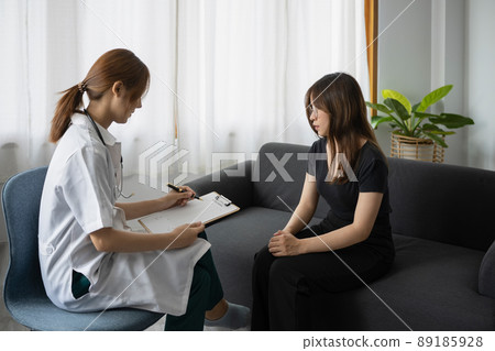 Female psychologist giving advice to patient. Mental health and psychotherapy concept. Female psychologist giving advice to patient. Mental health and psychotherapy concept. 89185928