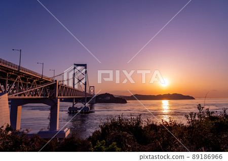 Sunset on Onaruto Bridge seen from Road Station Uzushio, Minamiawaji City, Hyogo Prefecture 89186966