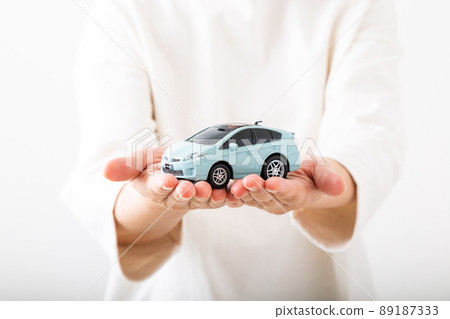 Middle woman with a car Middle woman with a car 89187333