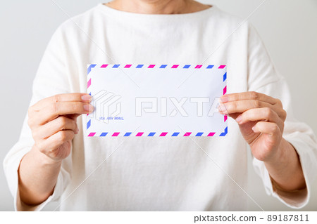 Middle woman with airmail Middle woman with airmail 89187811