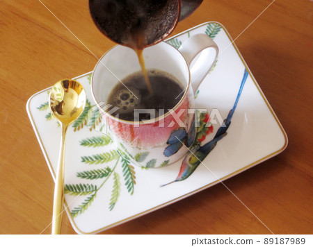 Barista preparing hot tasty drink from copper turk Barista preparing hot tasty drink from copper turk 89187989