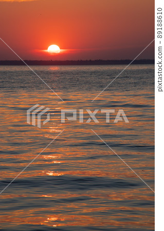 Beautiful red and orang sunset over the lake 89188610