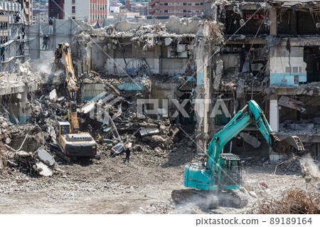 Building demolition work site by power shovel 89189164