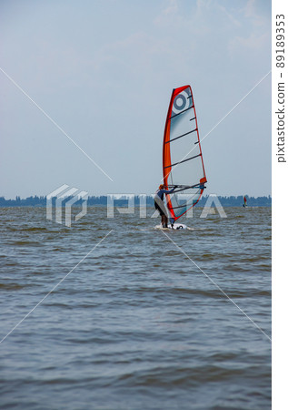 Windsurfing. Entertainment at sea, extreme sports, lifestyle during the summer holidays 89189353