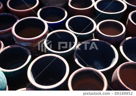 Faience old handmade clay pots. Old pottery 89189952