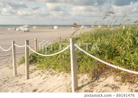 Pathway to the beach in Miami Florida with ocean background 89191476