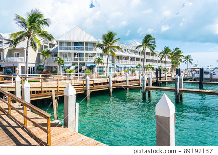 Quiet Street In Key West, Florida with wooden pier 89192137