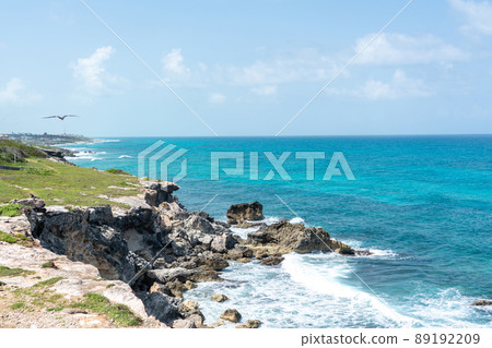 Punta Sur - Southernmost point of Isla Mujeres, Mexico. Beach with rocks on Caribbean sea 89192209