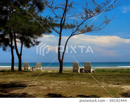 Tropical Beach Scene in Sabah Malaysian Borneo with Sun Loungers Tropical Beach Scene in Sabah Malaysian Borneo with Sun Loungers 89192444