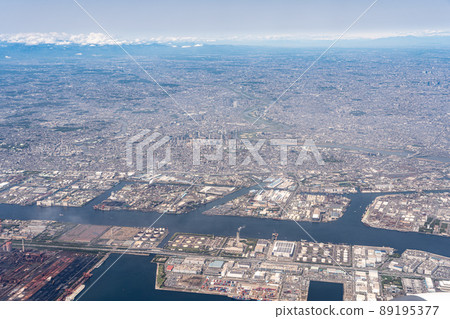 Aerial view from an airplane departing from Haneda Airport from the sky above Higashi Ogishima-Yokohama Bay Bridge 89195377