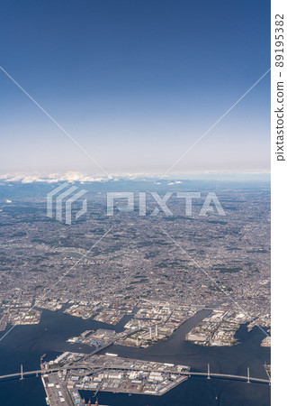 Aerial view from an airplane departing from Haneda Airport from the sky above Higashi Ogishima-Yokohama Bay Bridge 89195382