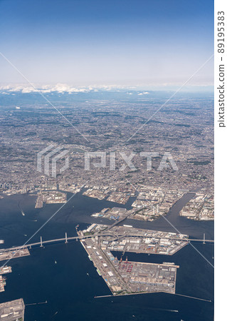 Aerial view from an airplane departing from Haneda Airport from the sky above Higashi Ogishima-Yokohama Bay Bridge 89195383