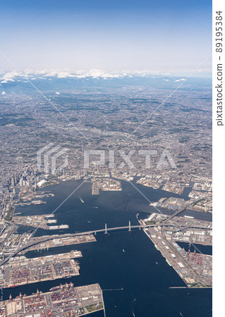 Aerial view from an airplane departing from Haneda Airport from the sky above Higashi Ogishima-Yokohama Bay Bridge Aerial view from an airplane departing from Haneda Airport from the sky above Higashi Ogishima-Yokohama Bay Bridge 89195384