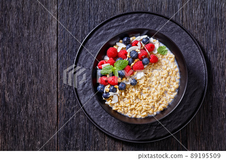 hulled whole grain oat porridge with berries hulled whole grain oat porridge with berries 89195509