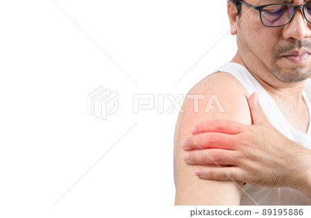 A middle aged man in white veat suffering from arm and shoulder pain isolated on white. A middle aged man in white veat suffering from arm and shoulder pain isolated on white. 89195886