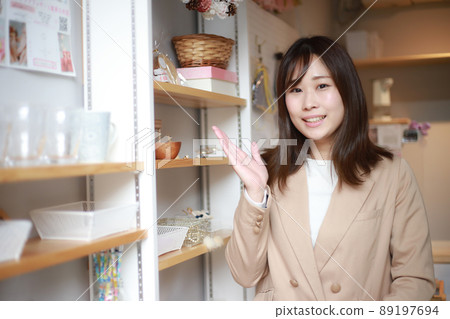 Smiley female clerk Smiley female clerk 89197694