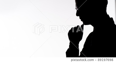Businessman worried silhouette Businessman worried silhouette 89197698