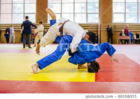 male athletes judoka in judo fight 89198055