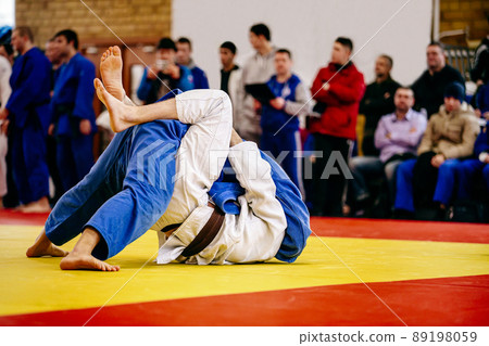 athletes judoists fight judo competition 89198059
