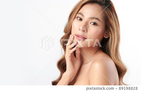 Beautiful young asian woman with clean fresh skin on white background, Face care, Facial treatment Beautiful young asian woman with clean fresh skin on white background, Face care, Facial treatment 89198828
