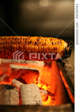 Yakimono corn soy sauce is hung down at the BBQ camp and it is exquisite Yakimono corn soy sauce is hung down at the BBQ camp and it is exquisite 89200361