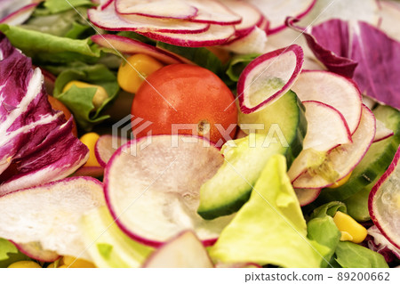 Fresh healthy salad with cherry tomatoes and mixed greens Fresh healthy salad with cherry tomatoes and mixed greens 89200662