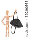 Wooden mannequin holding black N95 medical mask 89200668
