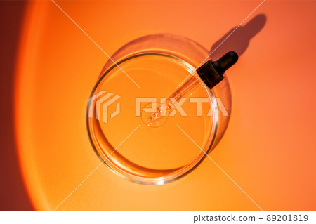 Laboratory glass petri with pipette and drop of water, serum, oil, beauty product. Natural medicine, cosmetic research, bio science. Concept of skincare and analysis. Dermatology. Flat lay, top view Laboratory glass petri with pipette and drop of water, serum, oil, beauty product. Natural medicine, cosmetic research, bio science. Concept of skincare and analysis. Dermatology. Flat lay, top view 89201819