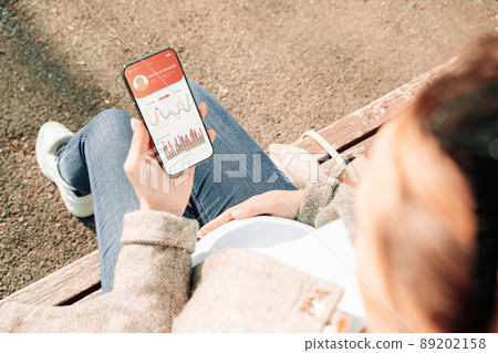 Pregnancy app. Mobile pregnancy online maternity application. Pregnant mother using phone. Pregnancy, medicine, pharmaceutics, health care and people concept. Pregnancy app. Mobile pregnancy online maternity application. Pregnant mother using phone. Pregnancy, medicine, pharmaceutics, health care and people concept. 89202158