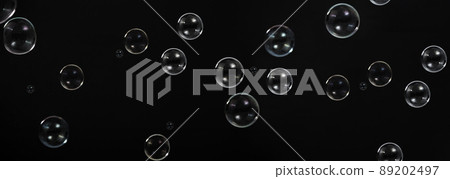 Soap bubble drop or Shampoo bubbles floating like flying in the air black background which represent refreshing moments and gentle soft. Bubbles drops for soap  shampoo or detergent product industry. 89202497